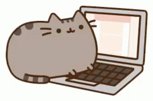 Cute gray cartoon cat sitting on a laptop keyboard, looking at the screen.