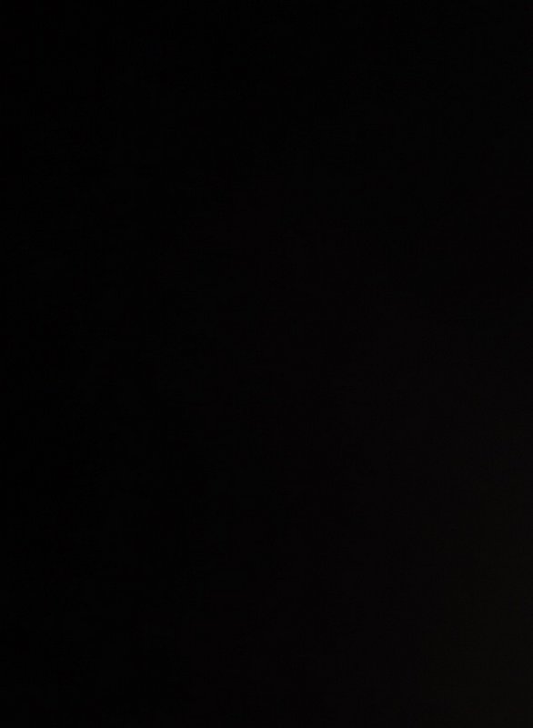 Underexposed solid near-black image with no distinguishable visible content, subjects, or discern...