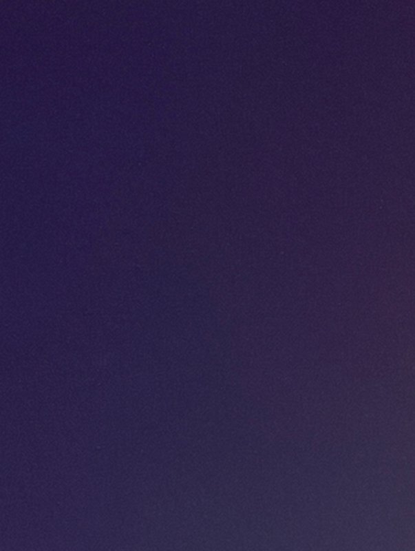 Deep rich violet purple matte textured background with subtle soft gradient and fine grainy finish