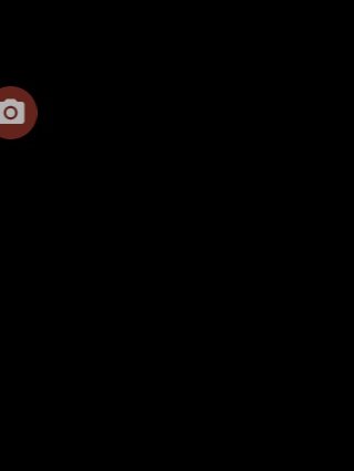 Blank black image with a small circular camera watermark on the left.