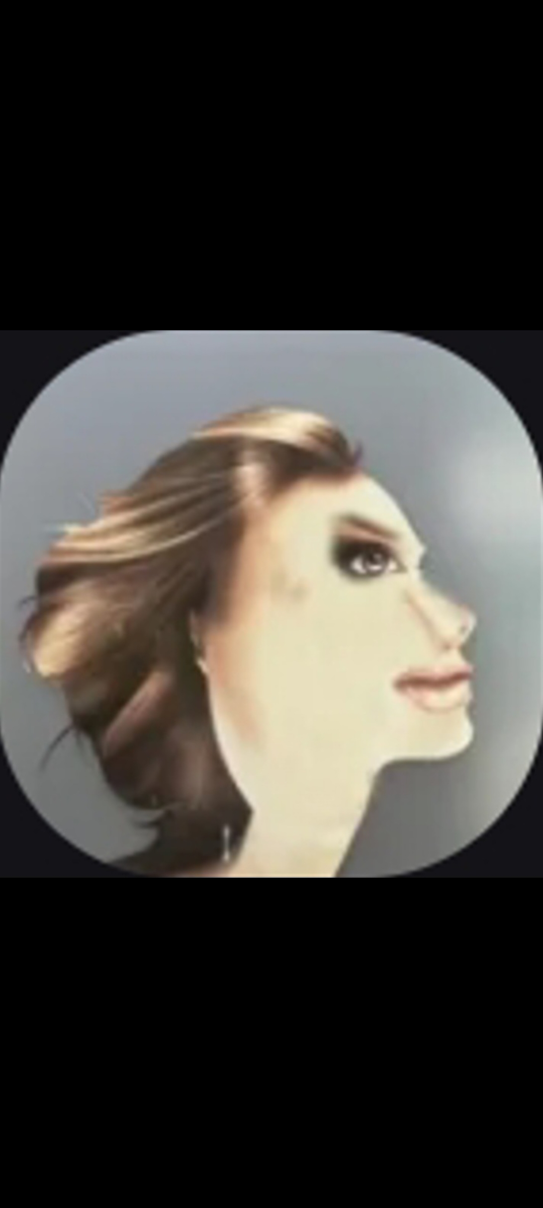 Profile portrait of a woman with windblown hair in a circular frame.