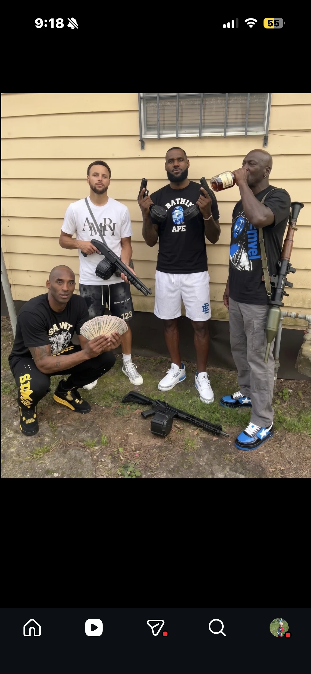 Group of five men posing with firearms outside a beige building.