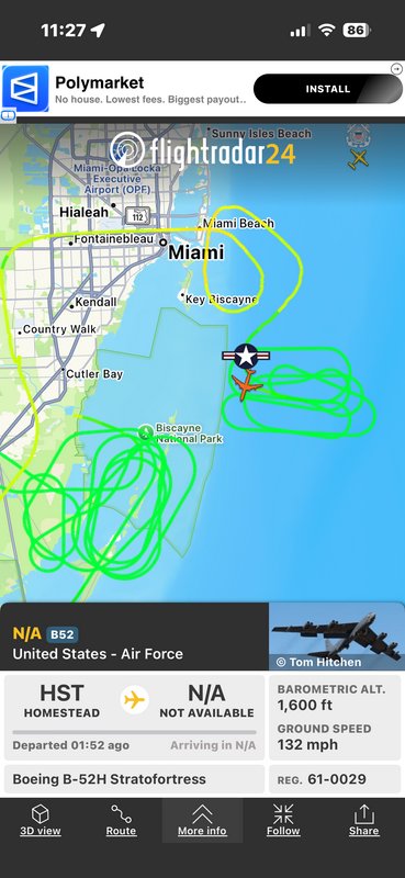 Live flight map near Miami showing a USAF B-52H Stratofortress with green path traces.