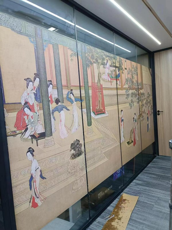 Large glass wall panels featuring a traditional Chinese palace scene with figures in flowing robes.