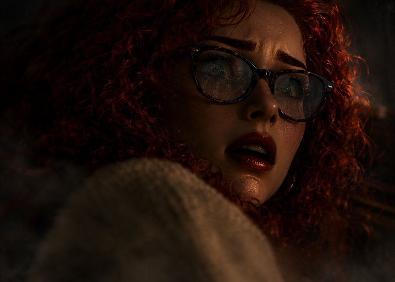 Woman with curly red hair and glasses in low, moody lighting with a surprised expression.