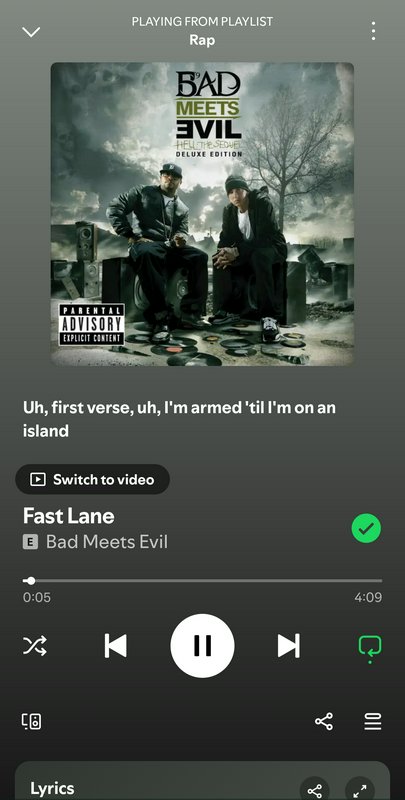 Album cover for Bad Meets Evil featuring two rappers in a dark cemetery setting with vinyl records.