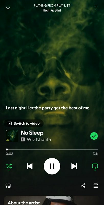 Dark green moody music player screen with a submerged face silhouette and Wiz Khalifa No Sleep pl...