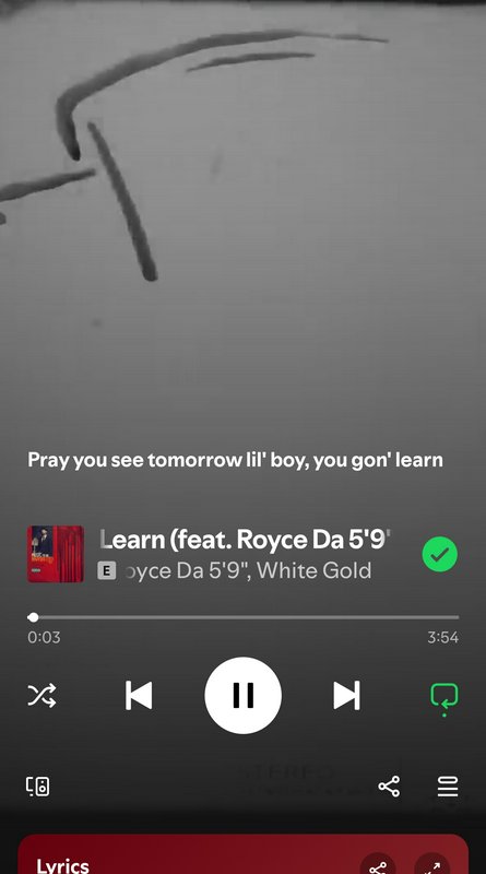 Screen capture of a mobile music player showing lyrics from a rap track: "Pray you see tomorrow l...