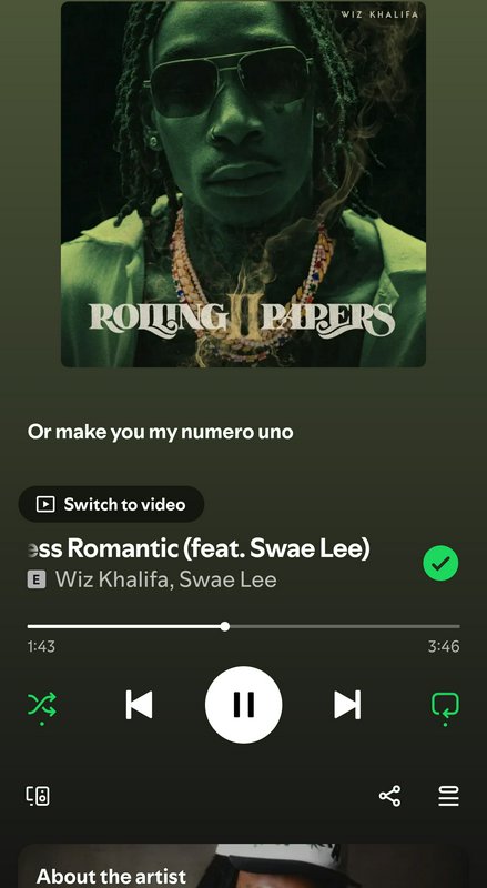 Spotify mobile player playing Wiz Khalifa & Swae Lee's Less Romantic, displaying Rolling Papers 2...
