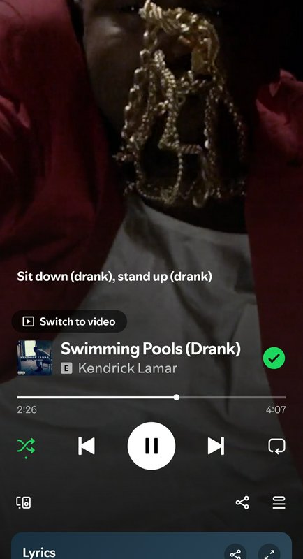 Mobile Spotify app interface playing Kendrick Lamar's 'Swimming Pools (Drank)', showing on-screen...