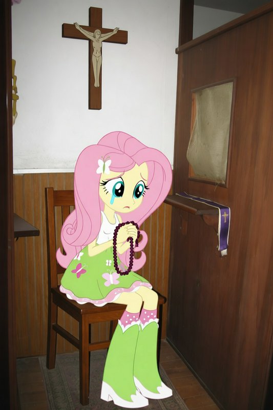 Cartoon cutout of a sad pink-haired girl sitting on a wooden chair in a church, holding rosary beads.